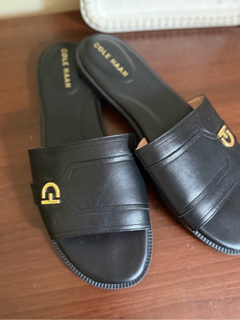 Cole Haan Black Leather Slide Sandals with Gold Accent